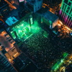 Guests arriving at a large event venue supported by professional parking management for concerts, conventions, and high-attendance events.