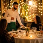 Server and guests in an upscale restaurant dining experience after valet parking.