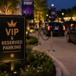 VIP and reserved parking sign at an upscale event entrance with luxury vehicles and a dedicated arrival lane for performers, sponsors, executives, and special guests.